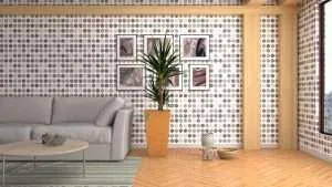 Moderne woonkamer met opvallende wandtegels in grijze stippen en houten visgraat vloer – inspiratie voor stijlvolle tegelwanden in het interieur.